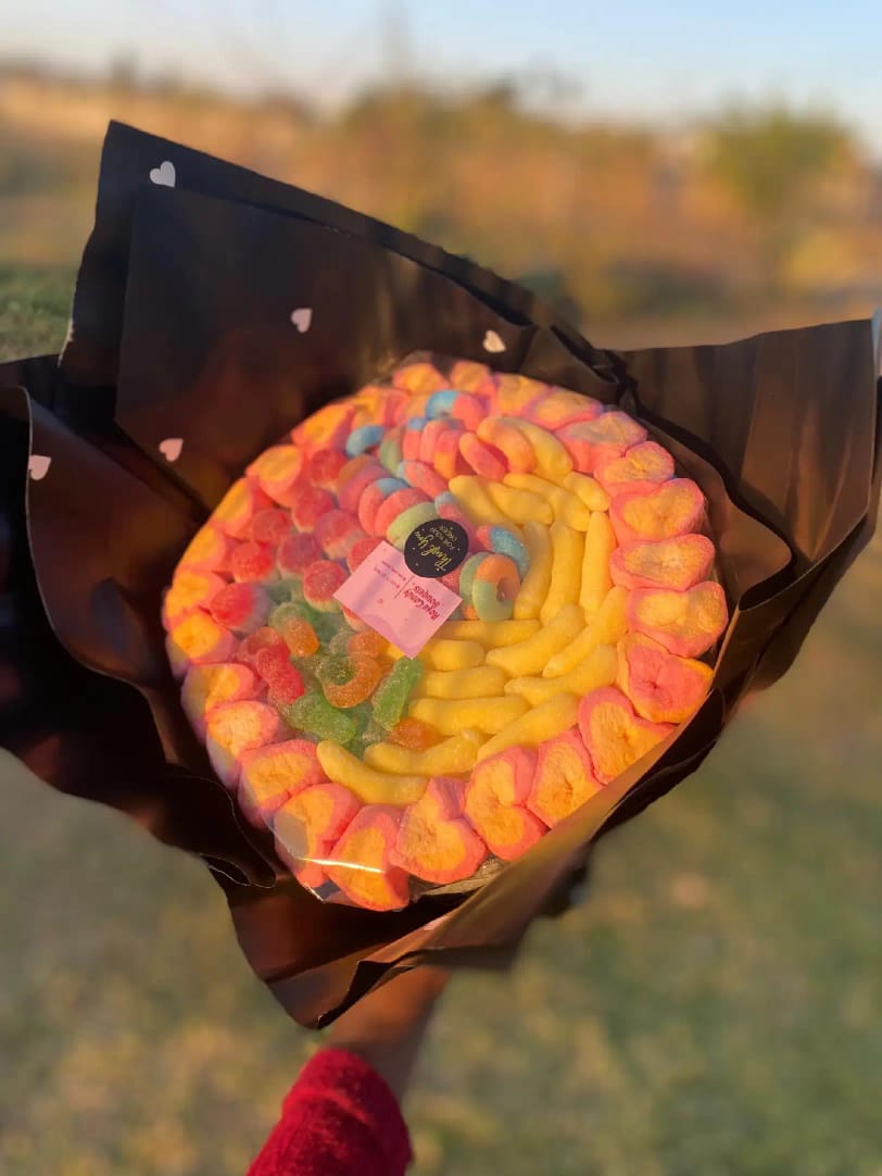 Marshmallow and gummy medium bouquet in black heart wrap
