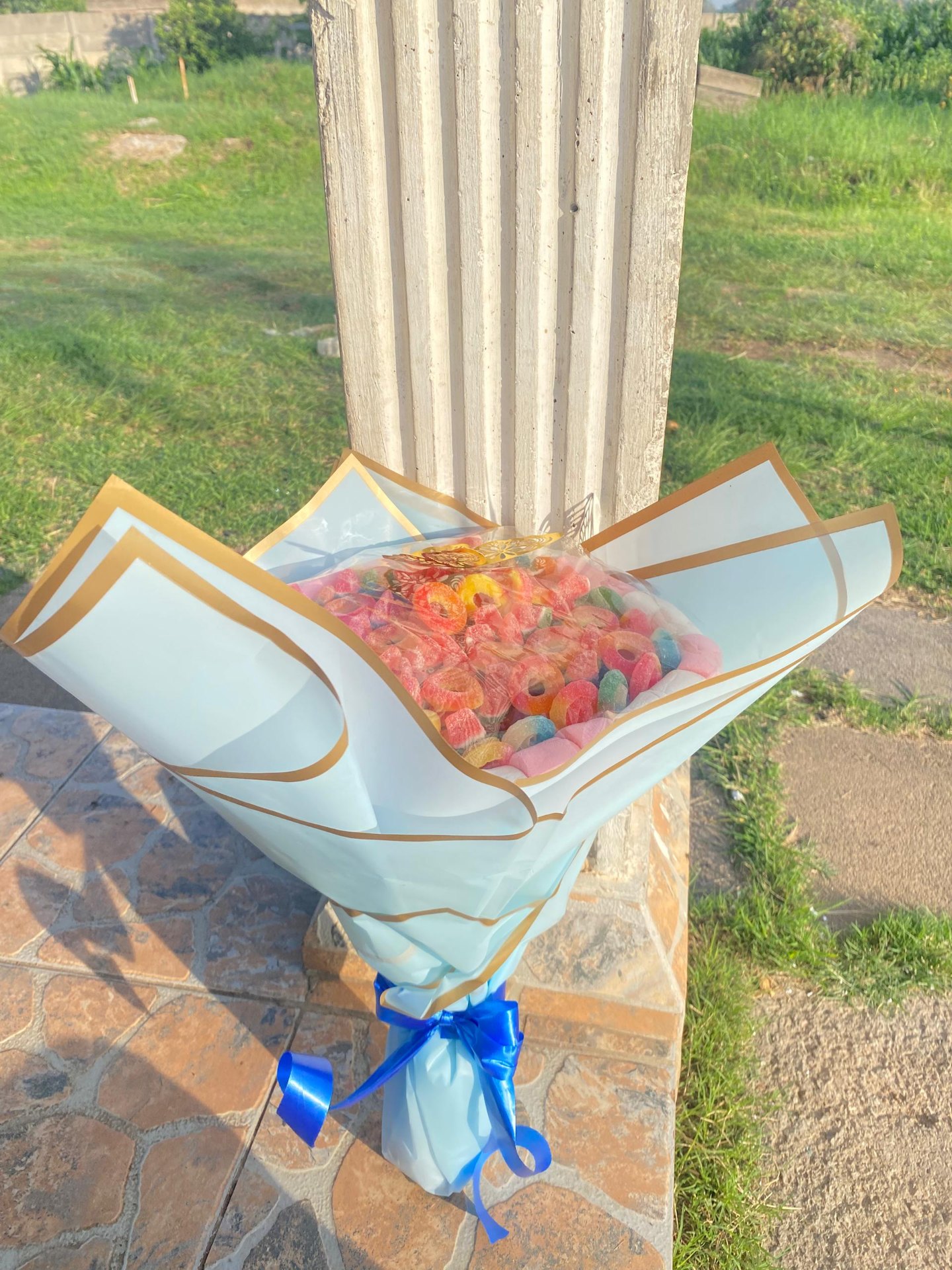 Pastel blue and gold candy bouquet