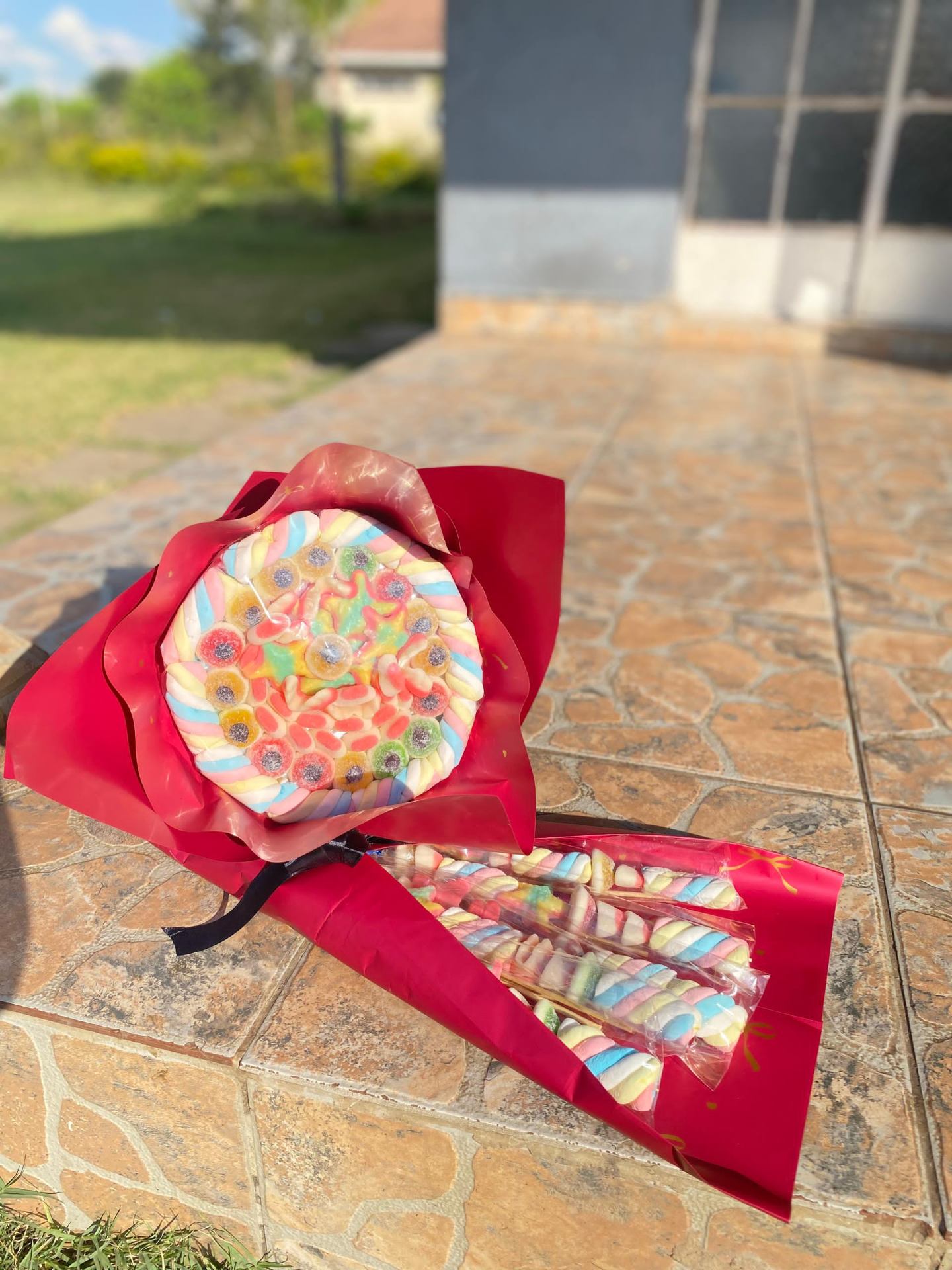 Grand red-wrapped marshmallow & gummy bouquet