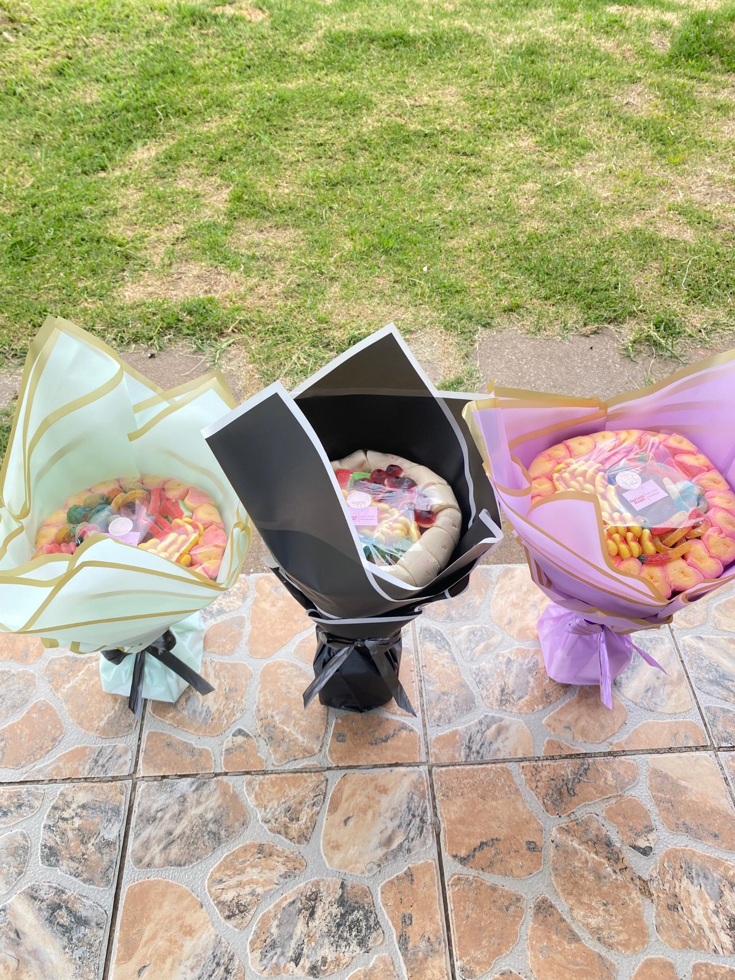 Trio of bouquets in mint, black and lilac